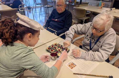 Residents enjoy baking with community friends
