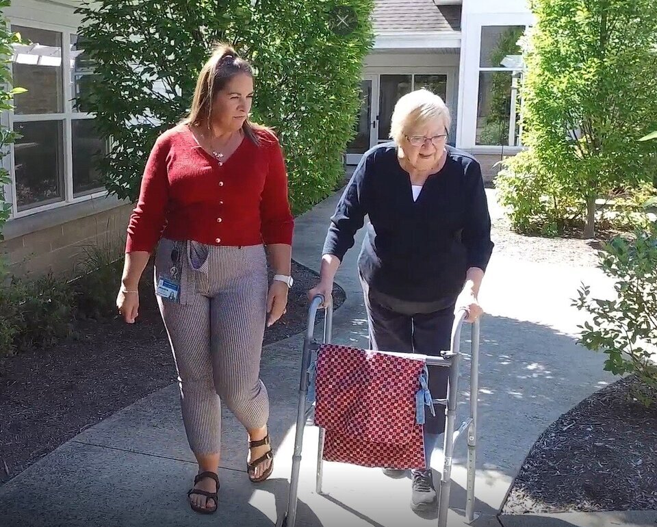 walking in memory care courtyard